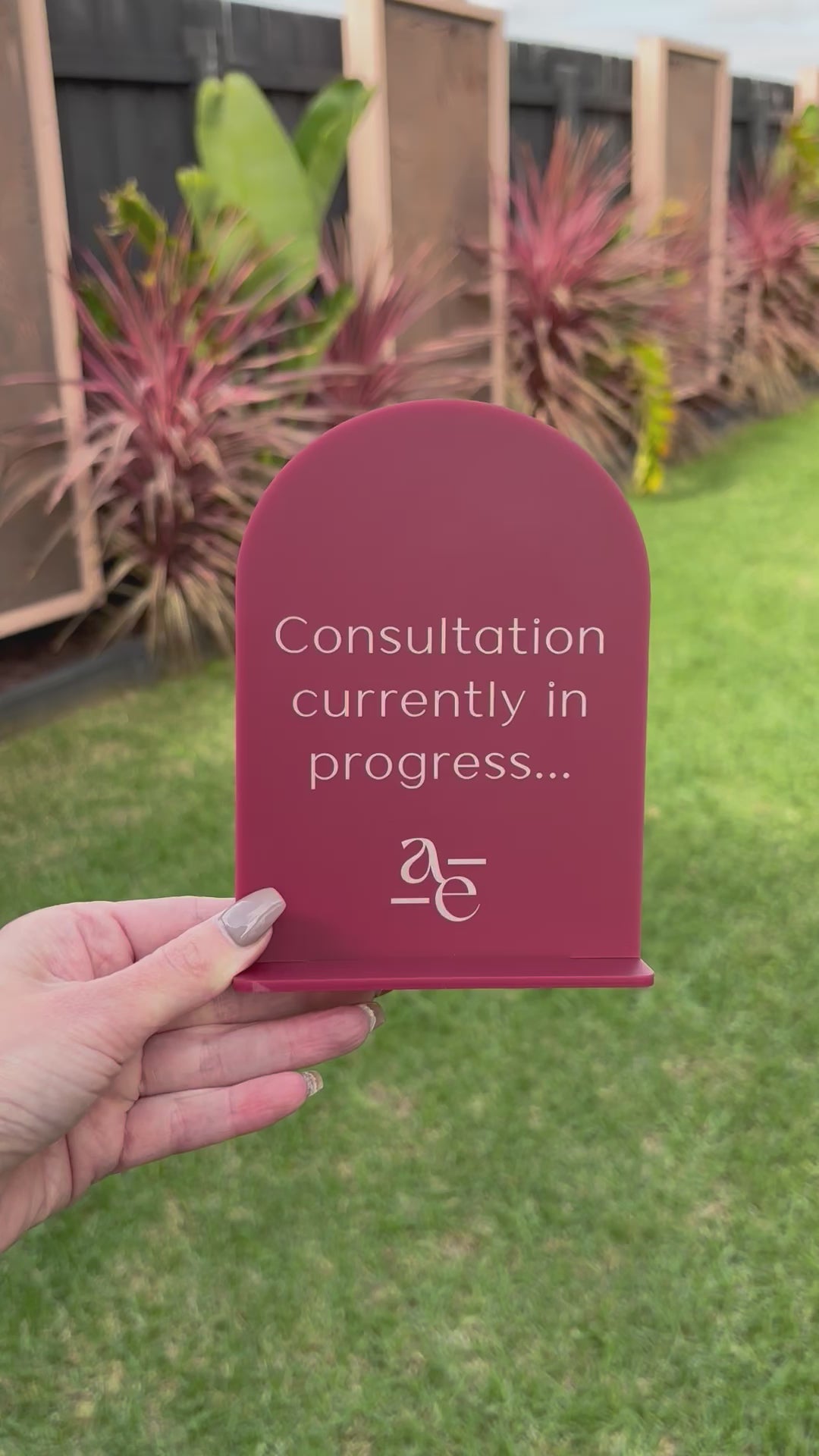 Custom burgundy consultation in progress mini business sign. Video 
