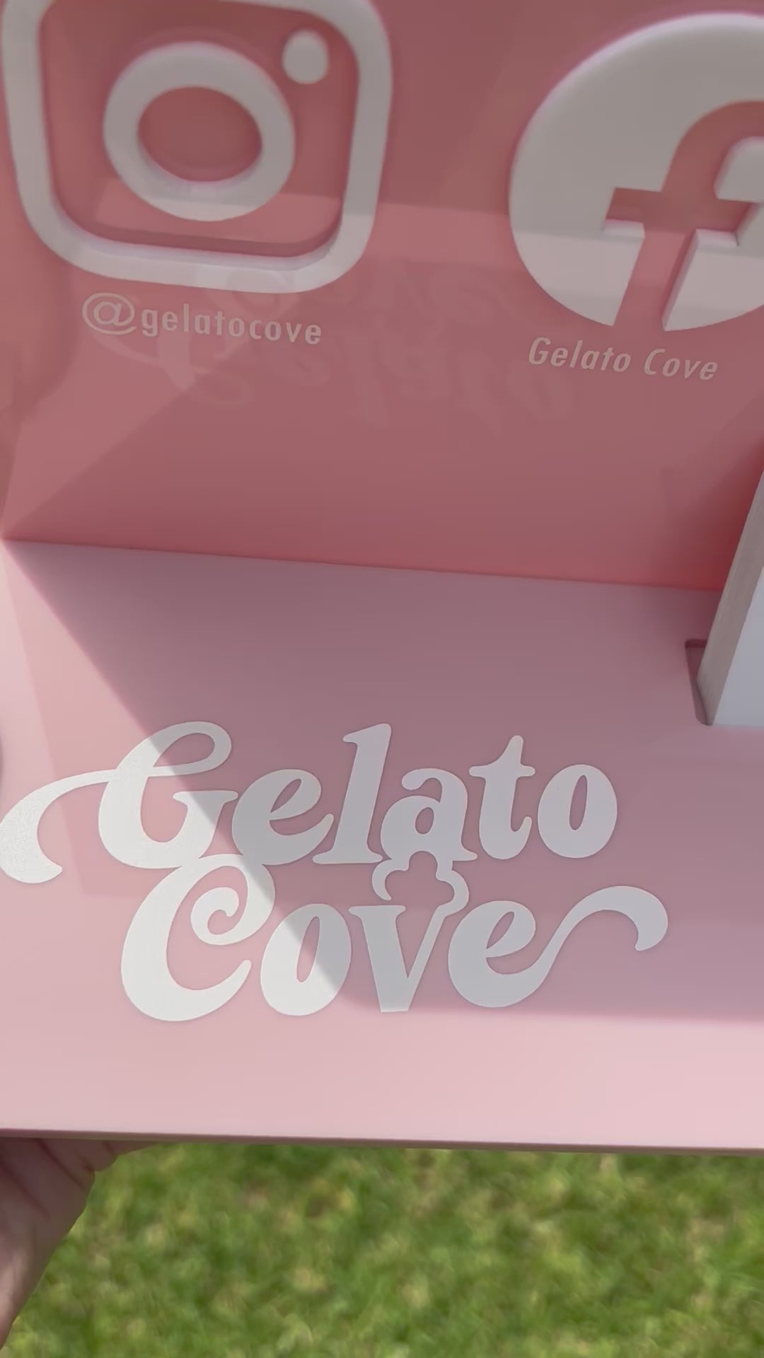 Pink acrylic counter sign with custom branding for gelato shop display. Video 