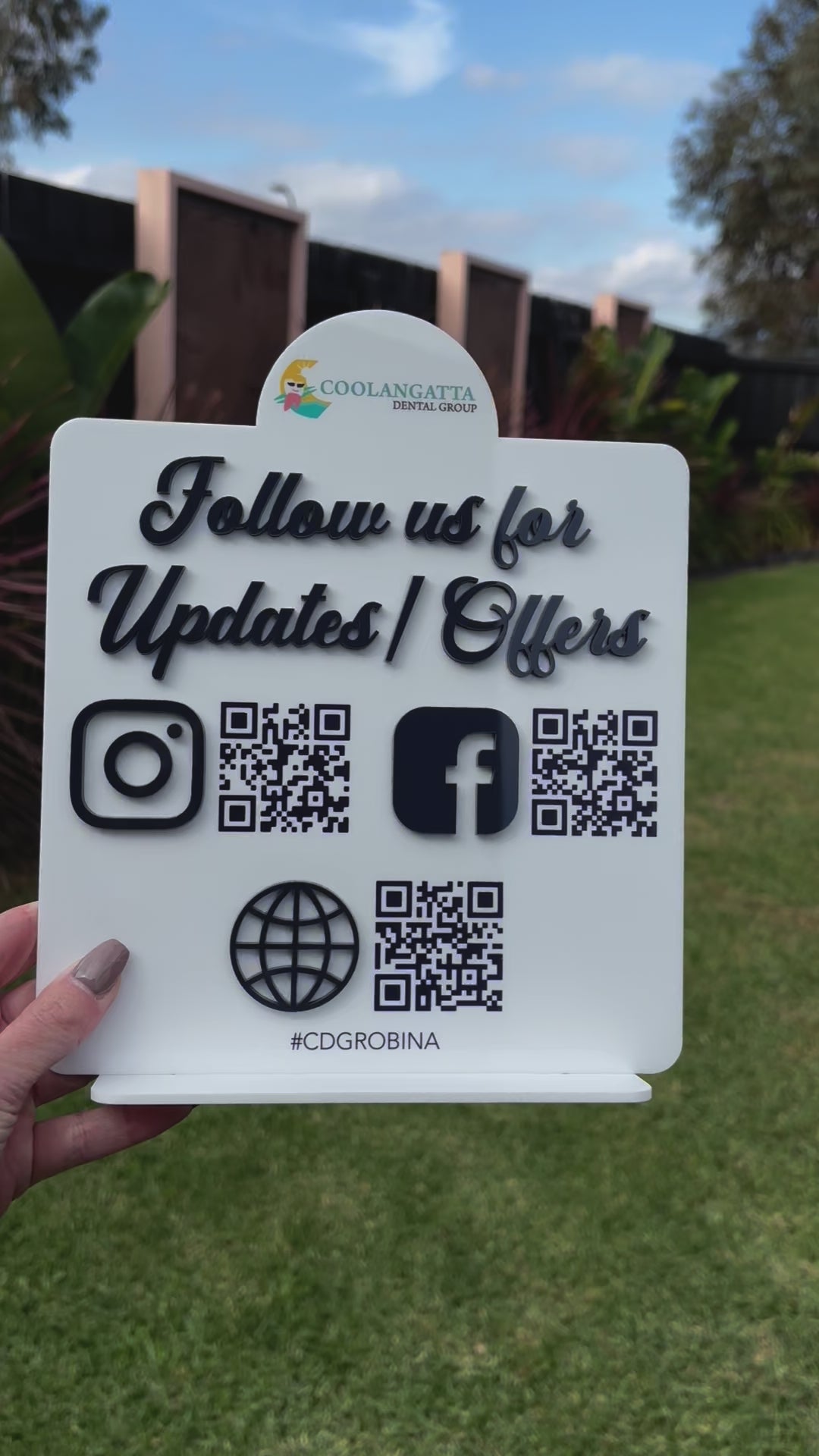 Follow us sign with QR codes and social media icons for small business counter display. Video 