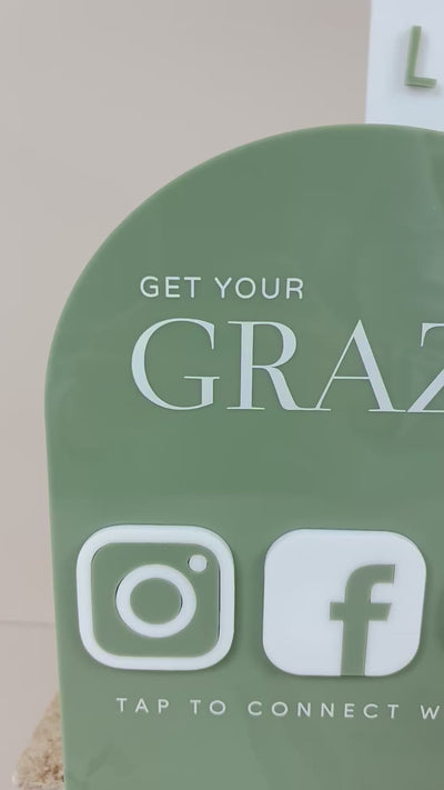 Green and white NFC social stand with Instagram, Facebook, Google icons. Video 