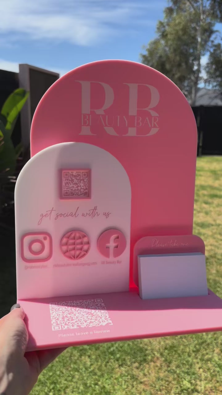 Pink acrylic social media display stand with card holder and QR code