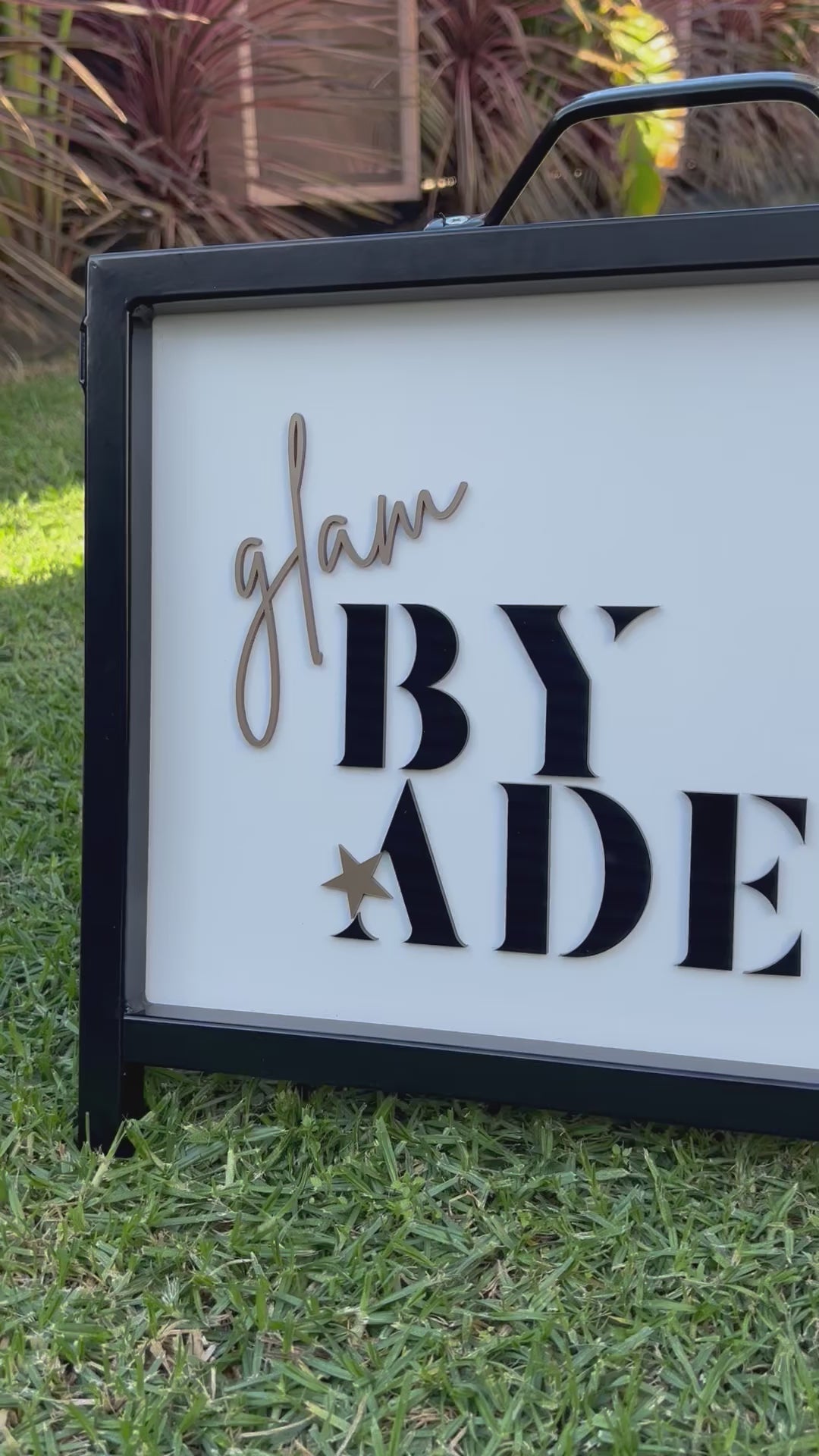 Close up of custom 3D acrylic landscape A frame sign with Glam By Adele logo. Video 