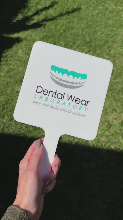 Video Custom handheld mirror with Dental Wear branding for clinics