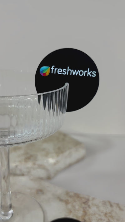 Close up of black branded drink tag with fork symbol. Video