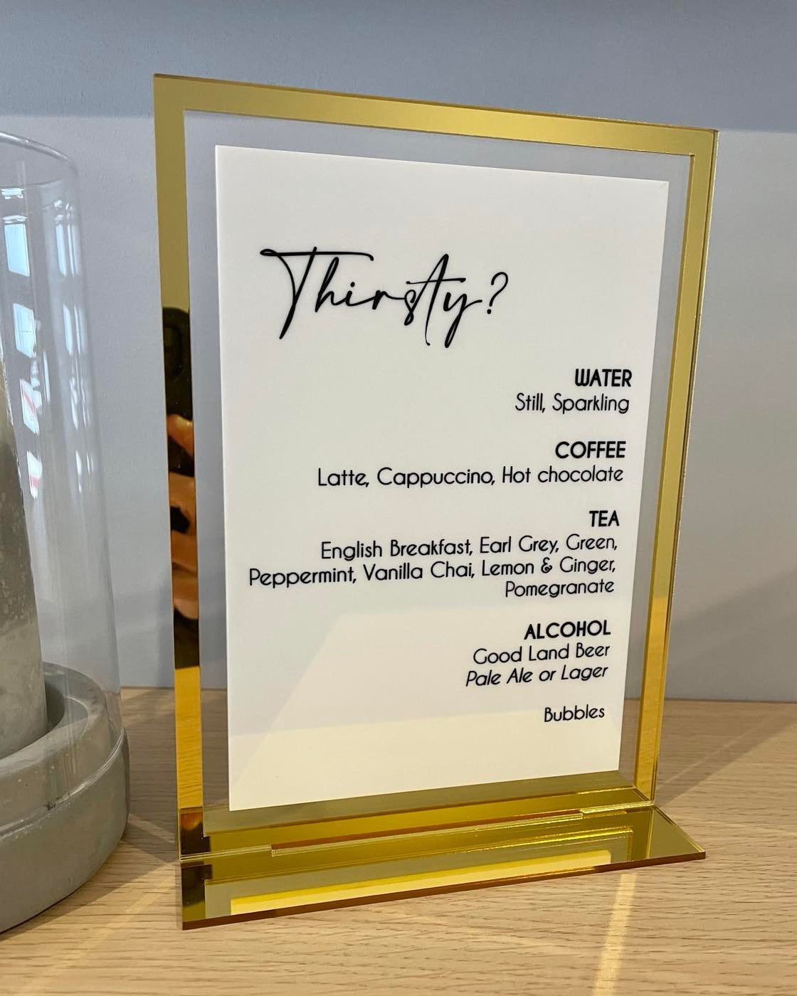 Modern acrylic drinks menu with gold stand for party or function