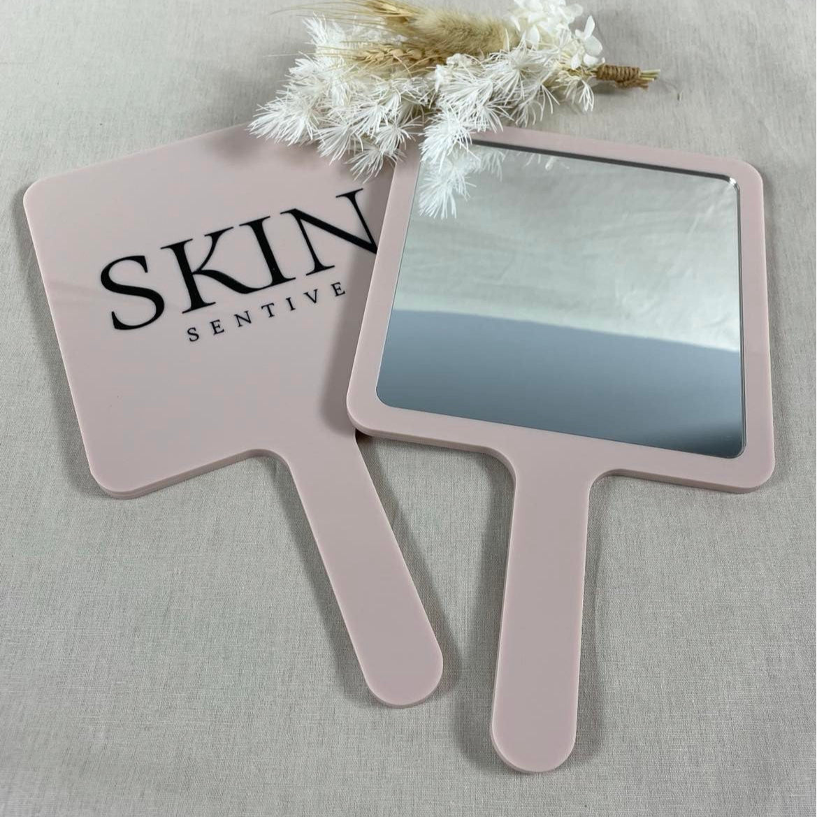 Skin clinic handheld mirrors with custom engraved branding