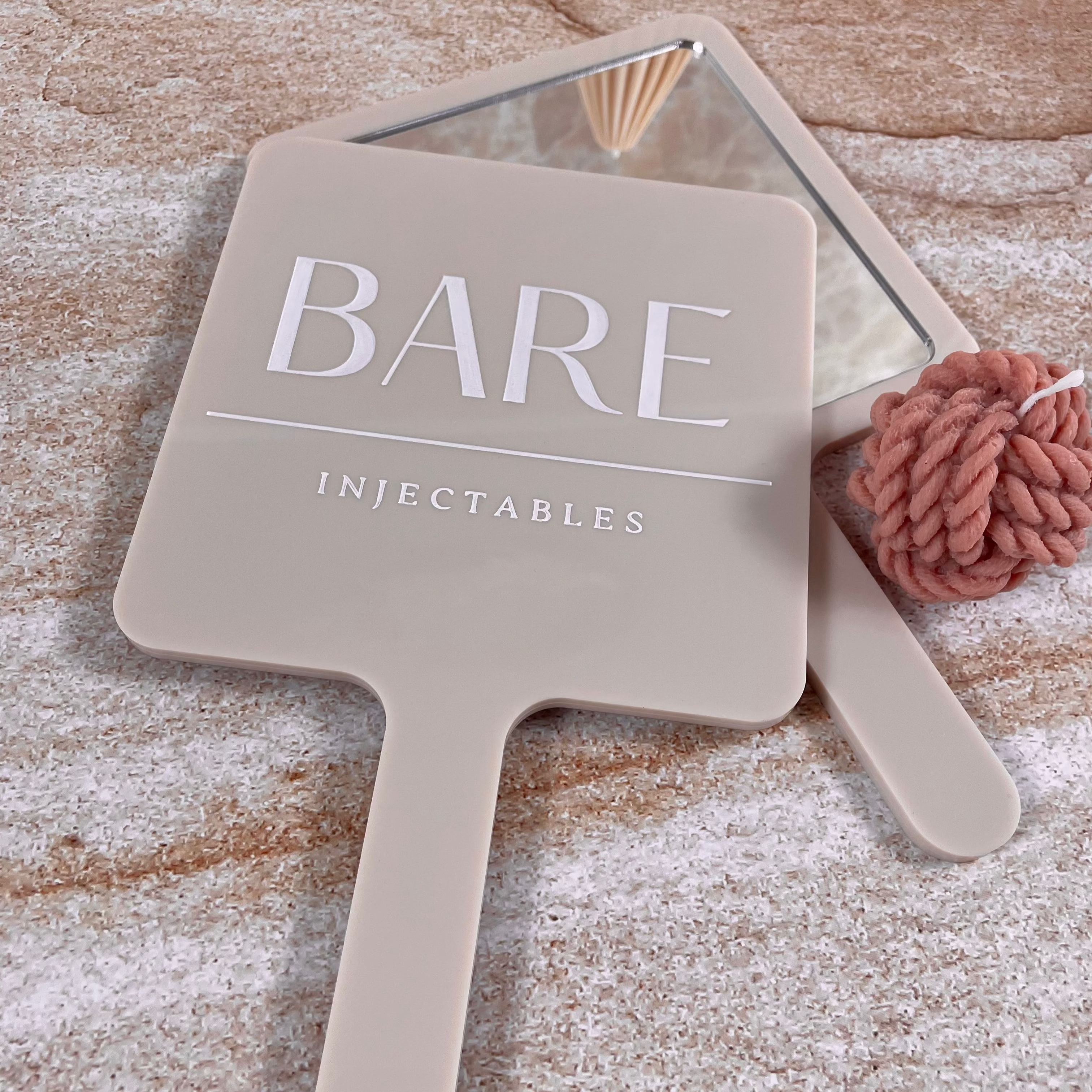 Bare Injectables logo on personalised square handheld mirror