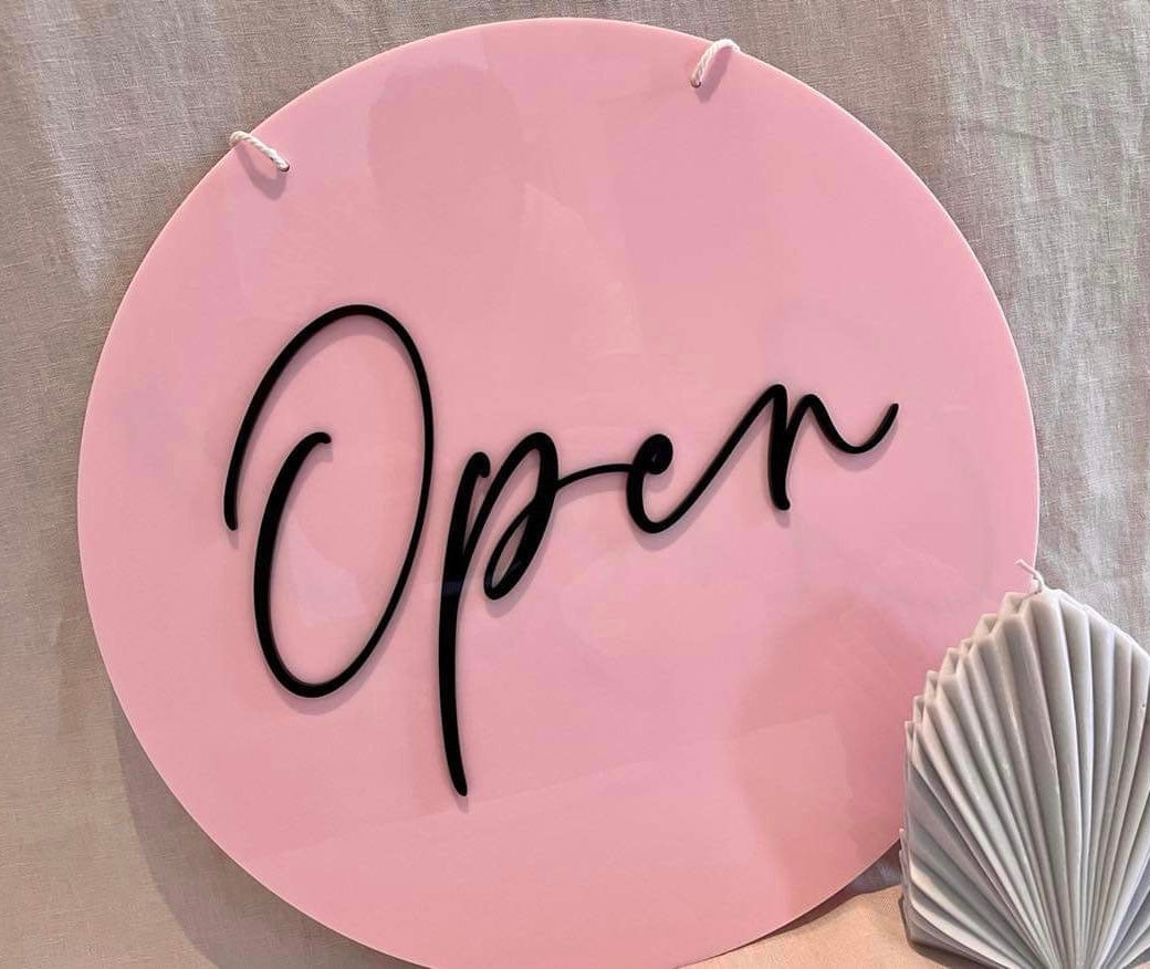 pink open and closed sign