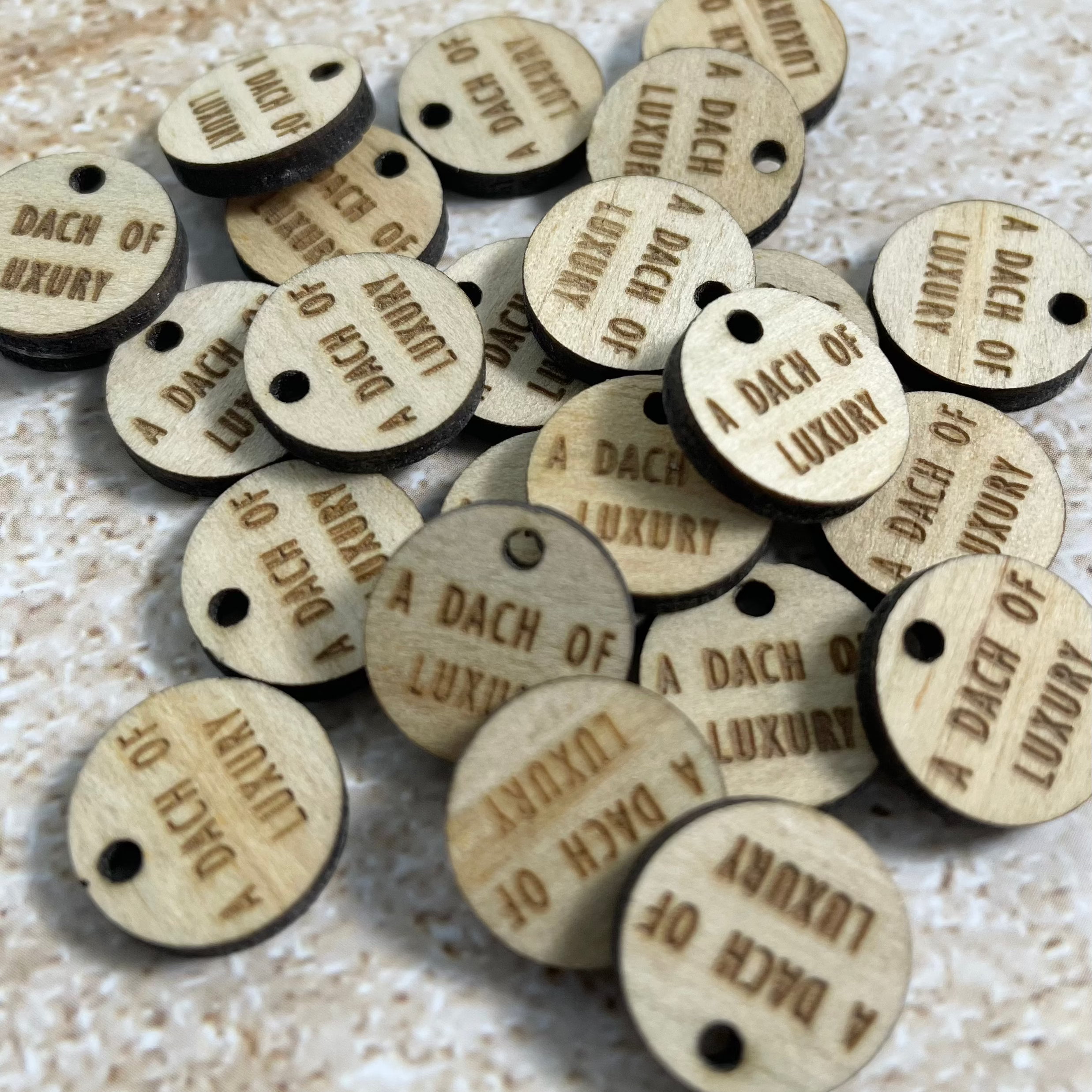 Custom round wooden tags with return and care instructions